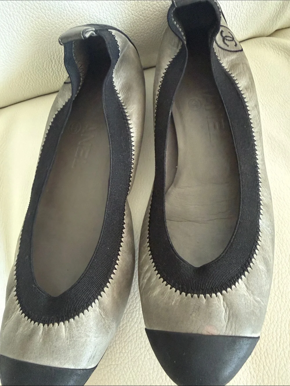 CHANEL Leather Gary and Black Cap-Toe Ballet FlatsToe Ballet Flats